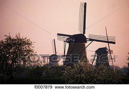 The Netherlands, Kinderdijk, sunset on mills View Large Photo Image Stock Photo - The Netherlands, Kinderdijk, sunset on mills. Fotosearch