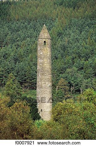 Stock Image - Ireland, Wicklow, Glendalough, Summer solstice tower. Fotosearch