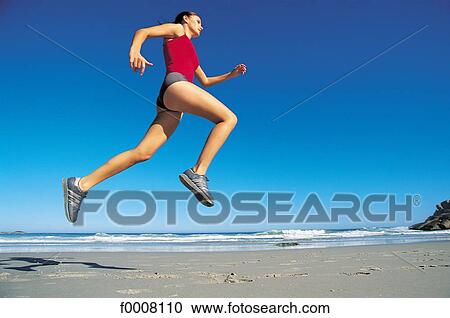 Stock Image - Sports in the sun, lifestyle, woman, girl, women. Fotosearch