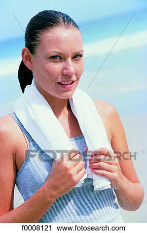 Stock Image - Sports in the sun, lifestyle, woman, girl, women. Fotosearch