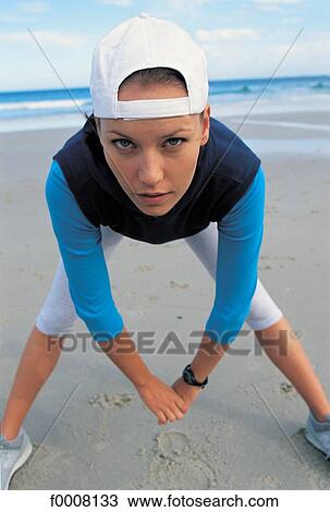 Stock Image - Sports in the sun, lifestyle, woman, girl, women. Fotosearch