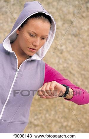Stock Image - Sports in the sun, lifestyle, woman, girl, women. Fotosearch