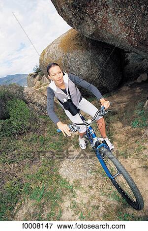 Stock Photo - Sports in the sun, lifestyle, woman, girl, women. Fotosearch