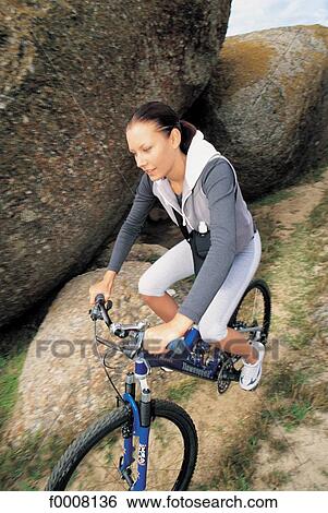 Stock Photograph - Sports in the sun, lifestyle, woman, girl, women. Fotosearch