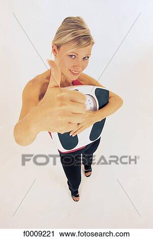 Stock Image - Studio attitudes, lifestyle, adults. Fotosearch