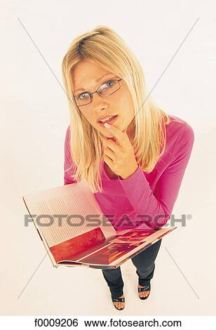 Stock Photograph - Studio attitudes, lifestyle, adults, inside. Fotosearch