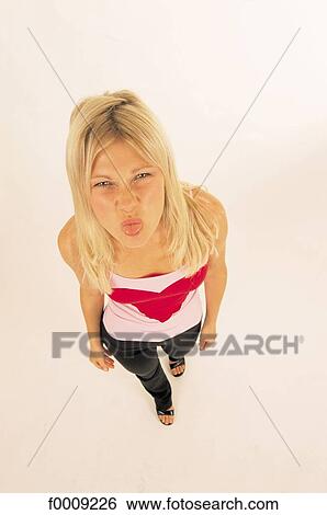 Stock Photograph - Studio attitudes, lifestyle, adults. Fotosearch