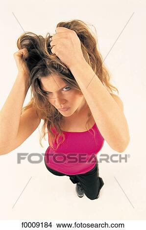 Picture - Studio attitudes, lifestyle, problem, anxious, anxiety. Fotosearch