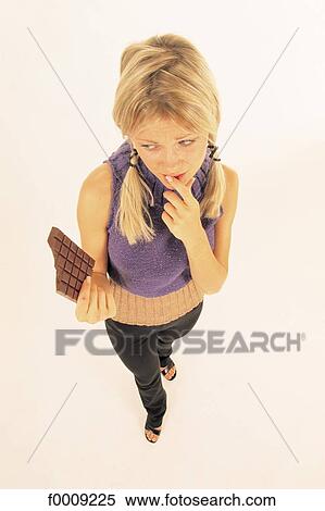 Stock Photography - Studio attitudes, lifestyle, high-angle-view, gaze, gazing. Fotosearch