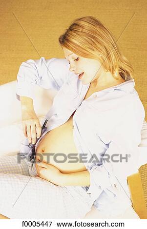 Stock Photo - Before birth, lifestyle, people, adults. Fotosearch