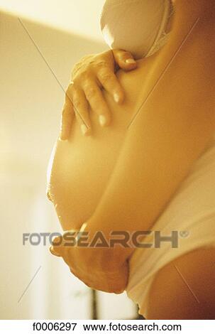 Stock Photo - Before birth, lifestyle, people, adults. Fotosearch