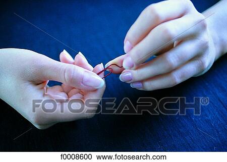 Stock Image - Body close-ups, lifestyle, hand, stress, problem. Fotosearch