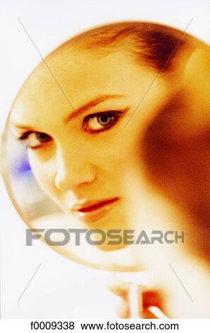 Stock Photo - In the mirror, lifestyle, inside, indoor, indoor shots. Fotosearch