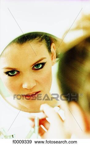 Stock Photo - In the mirror, lifestyle, inside, indoor, indoor shots. Fotosearch