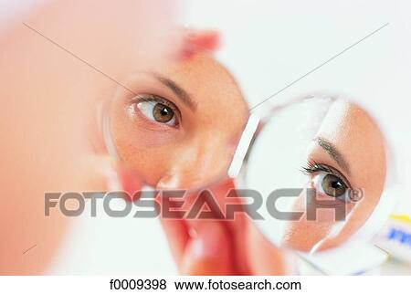Stock Photo - In the mirror, lifestyle, inside, indoor, indoor shots. Fotosearch