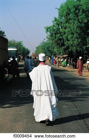 Picture - Senegal, Casamance, man dressed in a djellaba. Fotosearch