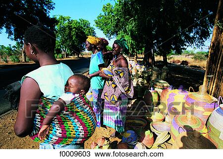 Senegal, Cayor, selling baskets on the side of the road View Large Photo Image Stock Image - Senegal, Cayor, selling baskets on the side of the road. Fotosearch