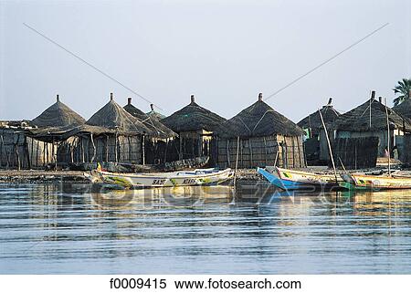Senegal, Foundiougne, fishermen's huts on the banks of the Saloum View Large Photo Image Stock Photography - Senegal, Foundiougne, fishermen's huts on the banks of the Saloum. Fotosearch