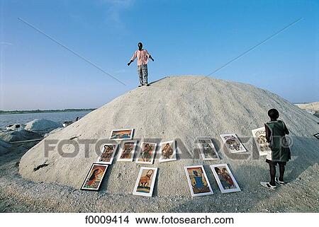 Senegal, Pink Lake, an artist and his works in the salt marsh View Large Photo Image Picture - Senegal, Pink Lake, an artist and his works in the salt marsh. Fotosearch
