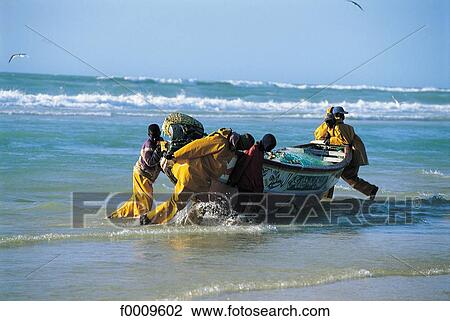 Stock Image - Senegal, Saint Louis, fishermen. Fotosearch
