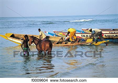 Picture - Senegal, Saly, fishermen. Fotosearch