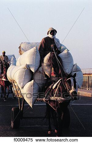 Stock Photography - Senegal, Sine Saloum, Kaolack. Salt market. Fotosearch