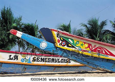 Senegal, Small coast, Saly, Lebou pirogues View Large Photo Image Stock Photograph - Senegal, Small coast, Saly, Lebou pirogues. Fotosearch