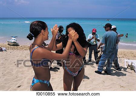 Stock Photography - Eastern beaches, dancing ladies. Fotosearch