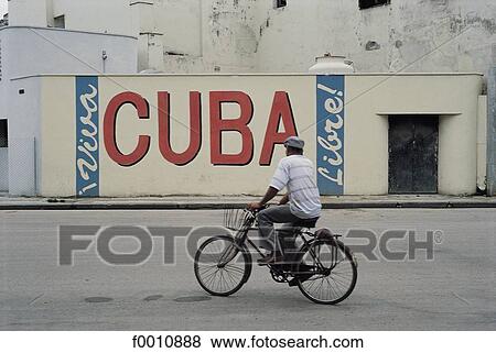 Havana, man on a bike View Large Photo Image Stock Photo - Havana, man on a bike. Fotosearch