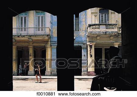 Havana, old man looking at a lady in the street View Large Photo Image Stock Image - Havana, old man looking at a lady in the street. Fotosearch