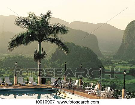 Valle de Los Vinales, Mogotes at sunset View Large Photo Image Stock Photo - Valle de Los Vinales, Mogotes at sunset. Fotosearch