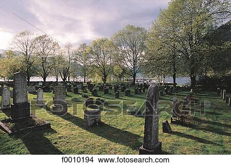 Picture - Hardanger fjord, Kinsarvik, cemetry. Fotosearch