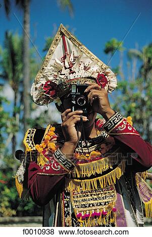 Baris dancer shooting a photograph View Large Photo Image Stock Photo - Baris dancer shooting a photograph. Fotosearch