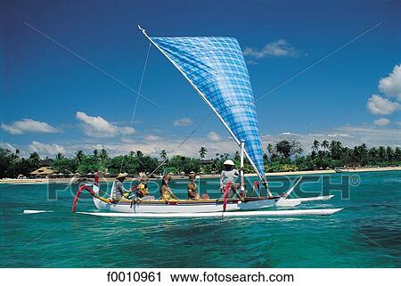 Dressed dancers in an outrigger View Large Photo Image Stock Image - Dressed dancers in an outrigger. Fotosearch