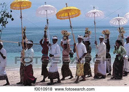 Odalan procession on Nusa Dua beach View Large Photo Image Stock Photo - Odalan procession on Nusa Dua beach. Fotosearch