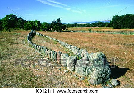 Stock Image - Sweden, Gotland, Gannarve, Viking grave as a ship. Fotosearch
