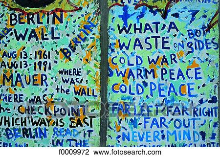 Stock Image - Grafittis on a Berlin wall piece. Fotosearch