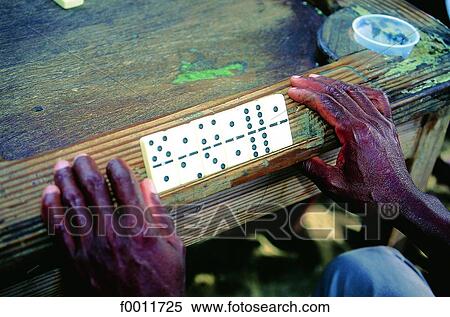 Stock Photography - Domenican Republic, Sanchez, playing dominos. Fotosearch