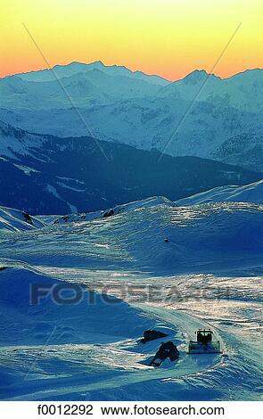Stock Image - Mountains at sunset. Fotosearch