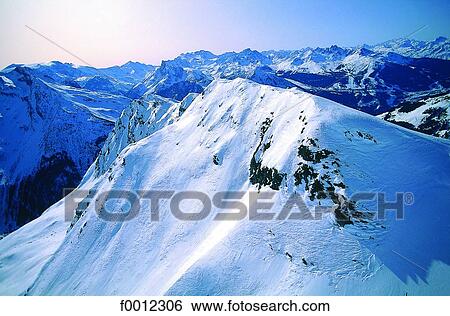 Stock Photograph - Snowy peak. Fotosearch