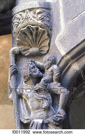Stock Image - Auvergne, Montferrand, architectural detail with St Christopher. Fotosearch