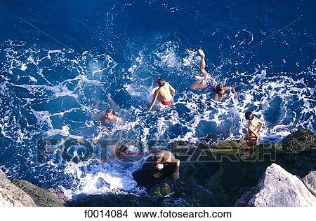 Dubrovnik, children bathing in the Adriatic sea View Large Photo Image Picture - Dubrovnik, children bathing in the Adriatic sea. Fotosearch
