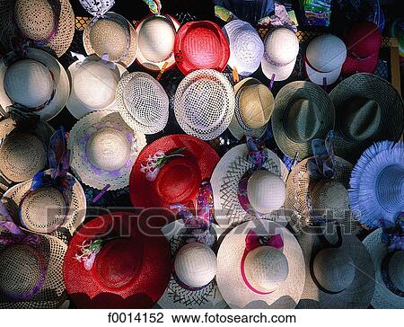 Stock Image - Korcula, hats stand at the Saturday market. Fotosearch