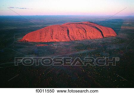 Australia, Northern territorries, aerial view of Ayers rock View Large Photo Image Stock Image - Australia, Northern territorries, aerial view of Ayers rock. Fotosearch