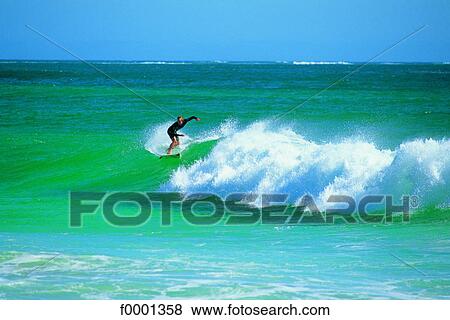 Stock Photo - Western Australia, surfer. Fotosearch