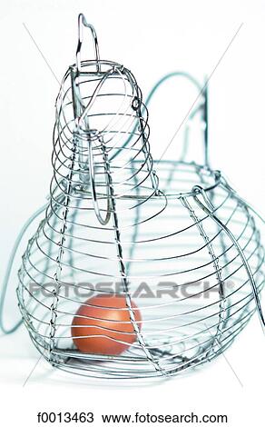 Egg in a basket View Large Photo Image Stock Image - Egg in a basket. Fotosearch