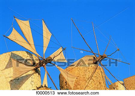 Stock Image - Karpathos, Olympos, windmills. Fotosearch