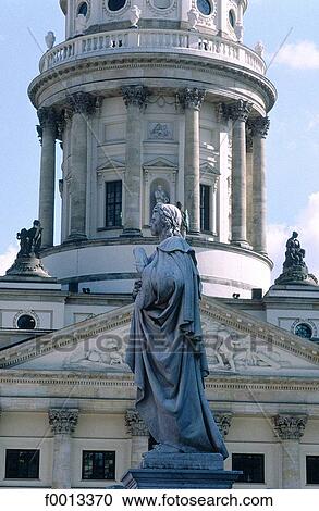 Stock Image - Gendarmenmarkt square, poet Schiller statue and French dome. Fotosearch