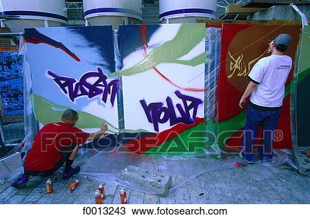 Hackeser market, graffitti artists at work during a socialist meeting View Large Photo Image Stock Image - Hackeser market, graffitti artists at work during a socialist meeting. Fotosearch