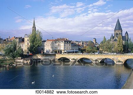 Stock Image - France, Lorraine, Metz, river and Temple neuf. Fotosearch